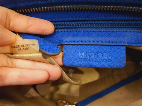 fake michael kors backpack vs real|michael kors serial number checker.